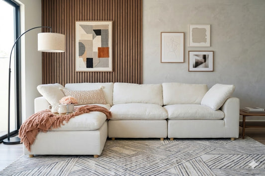 Lunn Cloud Sectional in cream with styled accessories